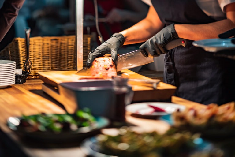 chef making catering food in restaurant